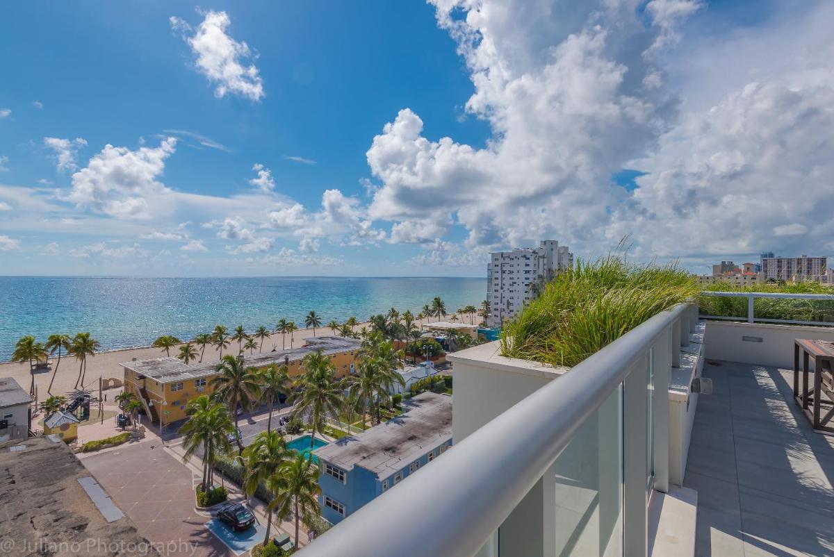 Отель CH Luxury Condos & Studios On The Beach