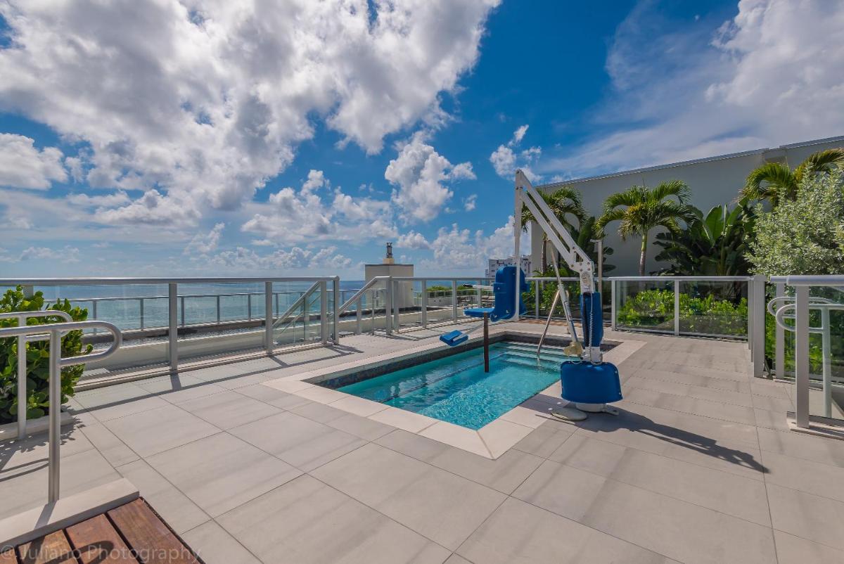Отель CH Luxury Condos & Studios On The Beach